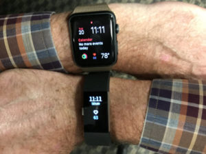 wearing a fitbit and apple watch